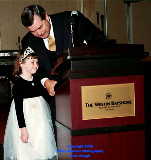 father, guest speaker, presentor, daughter, young girl, podium, photographs, photography, photographer, pictures, images, banquets, Palm Springs, California, California, 