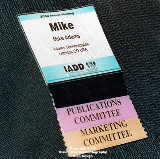 name tag, closeup, man's suit, photographs, Palm Springs, California, California, convention, conference, trade show, trade shows, shows, photography, photographer, pictures, images, meetings planners, special events, banquets