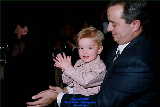 father and son, son clapping, Palm Springs, California, California, young boy, future, president, photographs, conference, shows, photography, photographer, pictures, images, special events, banquets