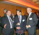 3 men, executives, Palm Springs, California, California, business intermission, reception, talking, photographs, trade show, trade shows, shows, photography, photographer, pictures, images, banquets